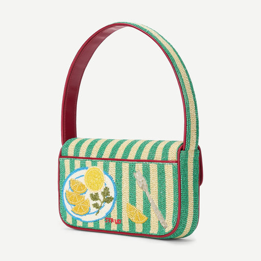Staud Tommy beaded purse in Summer Lobster color with intricate beadwork, featuring a structured shape and top handle.