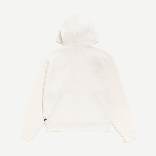 Stussy textured zip hooded sweater in bone color, featuring a hood, front zipper, and cozy knit design.