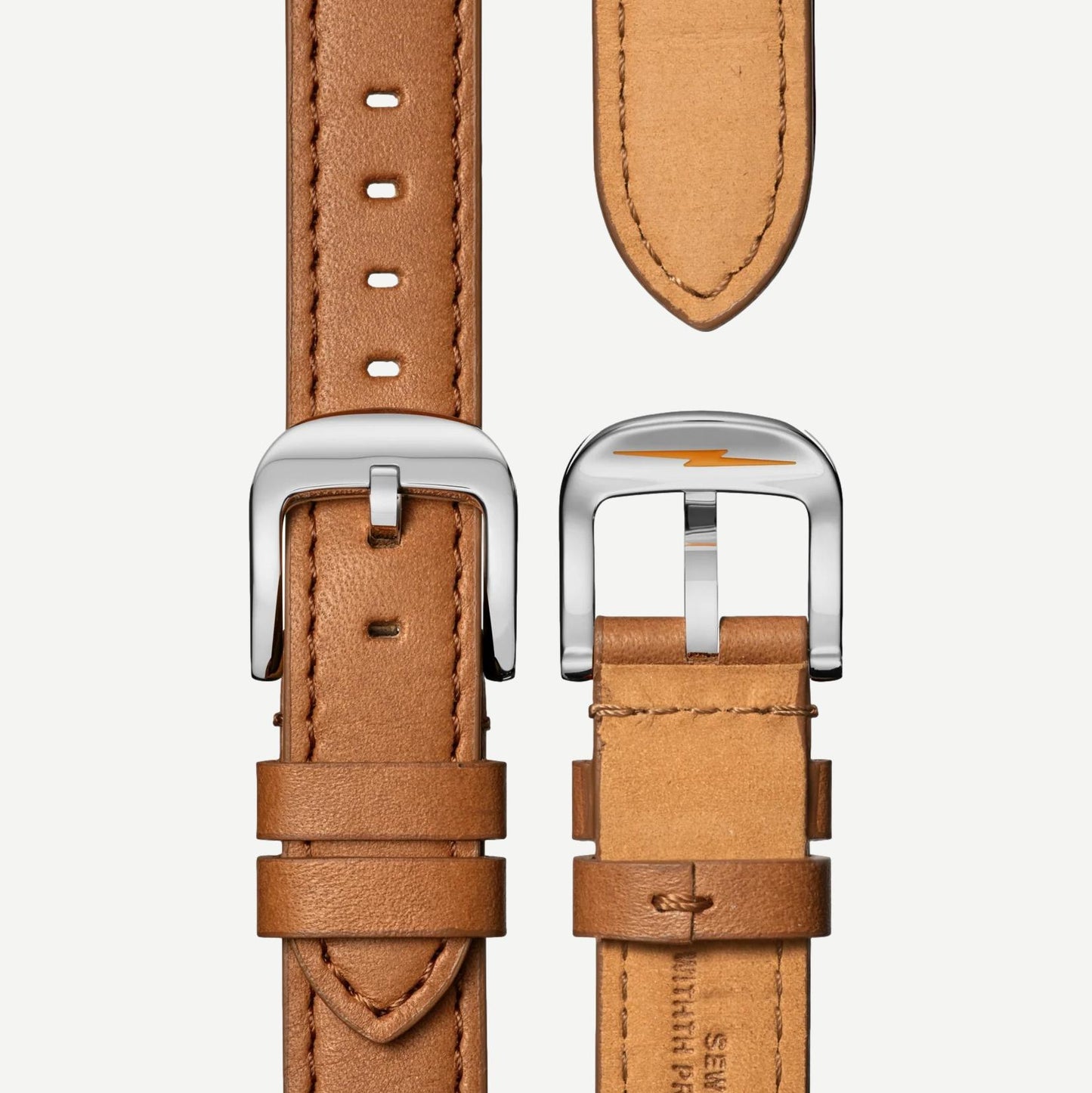 Shinola Canfield 3HD 38mm Astro Blue watch with tan leather strap, showcasing the watch face and stylish design.