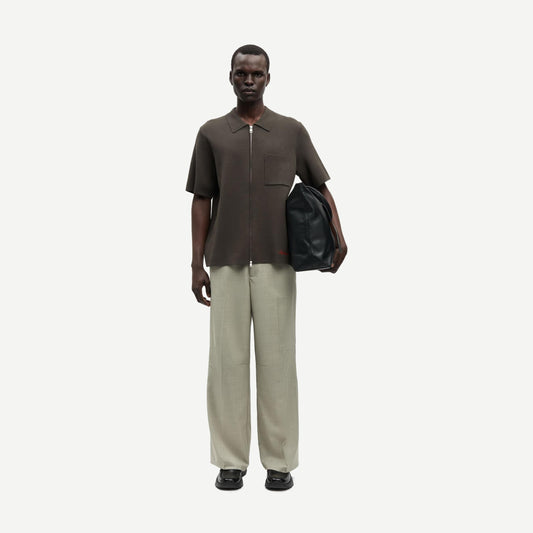 Samsoe Samsoe Sarico Zip Shirt in black olive, featuring a stylish zip-up design and casual fit, displayed on a model.