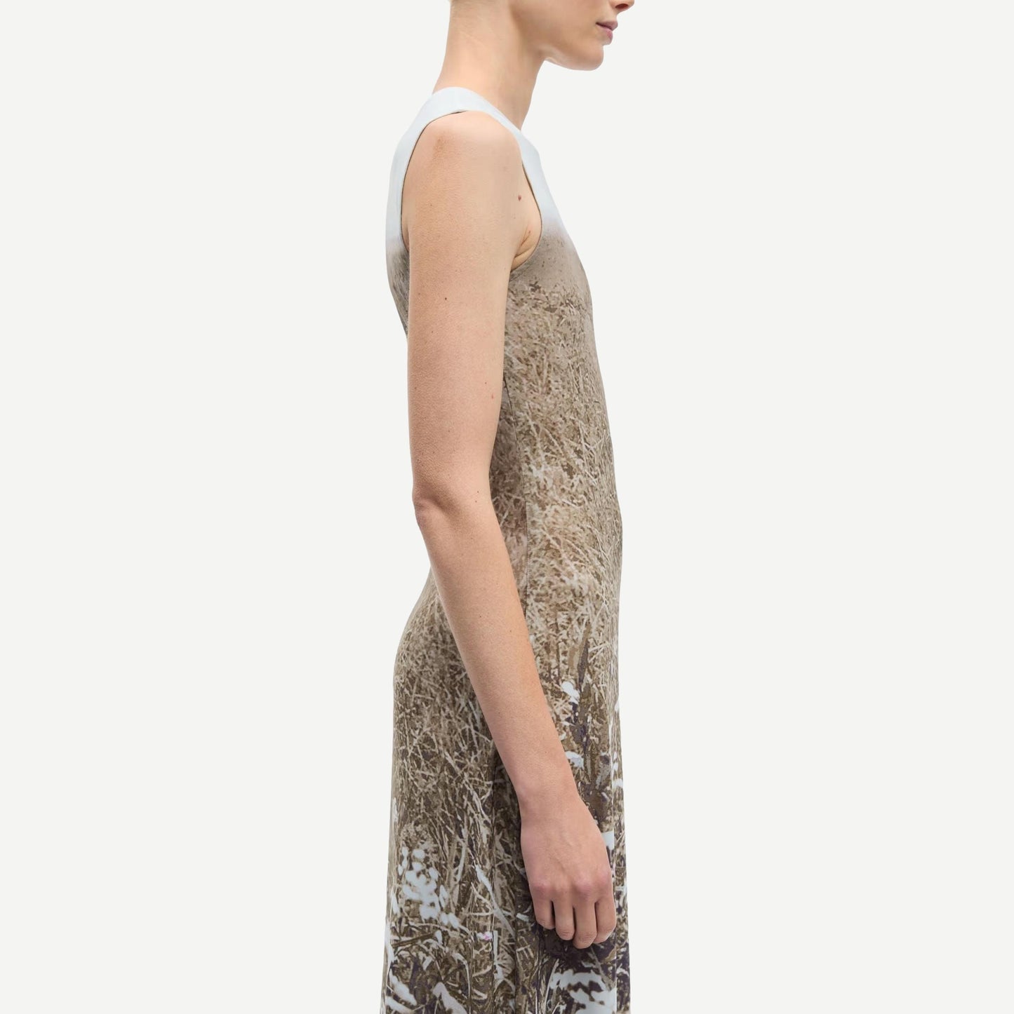 Samsoe Samsoe Saangel Dress in Hazy Fields with flowing fabric and soft color, shown on a model against a natural background.