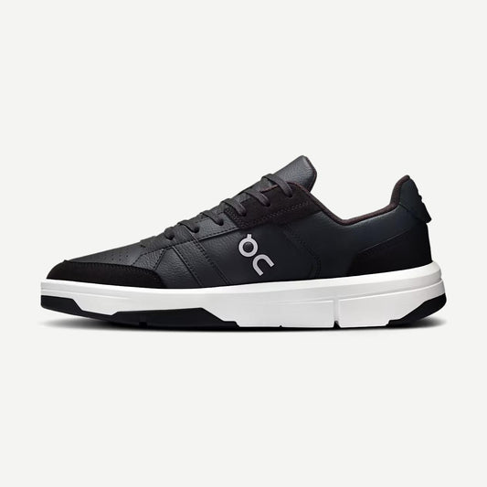 On Cloud Roger Clubhouse men's black and white footwear showing the stylish athletic shoe with mesh and rubber sole details.