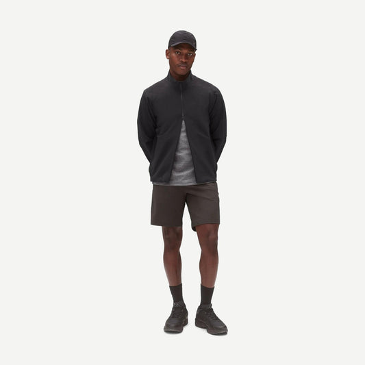 Reigning Champ Stretch Warp Knit Coach's Slim Shorts 9-inch in carbon color, displaying a fitted silhouette and lightweight fabric.