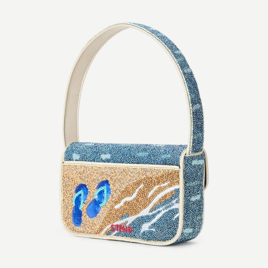 Staud Tommy Beaded Bag in neutral tones, small purse with intricate bead detailing and compact design for stylish carrying.