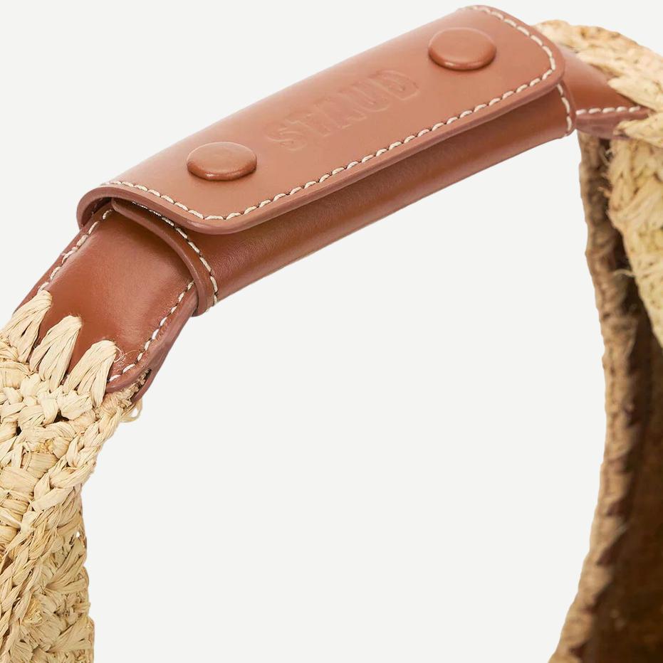 Staud Moon raffia tote bag in natural and tan with woven texture, large purse style for casual or summer use.