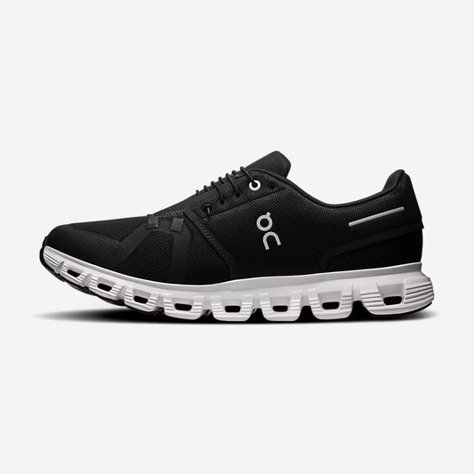 On Cloud Cloud 6 women’s running shoes in black and white with breathable mesh and cushioned midsoles for comfort.