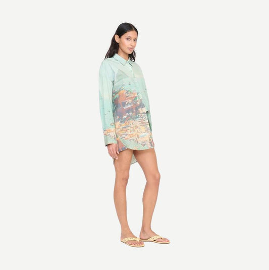 Staud Sandbar Top from Endless Summer collection, stylish shirt with a relaxed fit, displayed on a hanger.