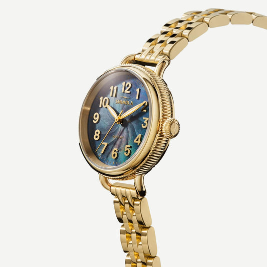 Shinola Birdy 31mm gold watch with gray mother-of-pearl dial and gold-tone bracelet