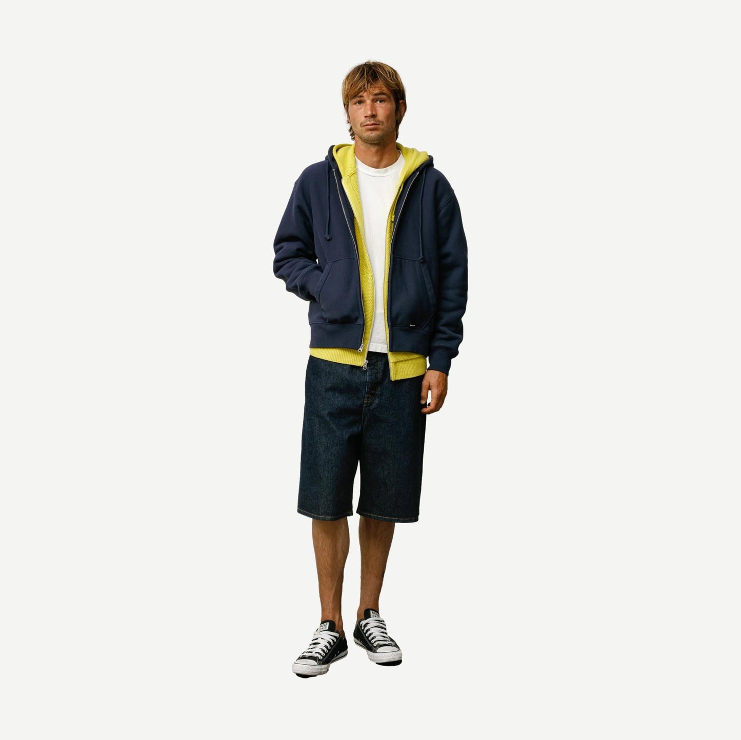 Stussy navy baggy beach shorts with relaxed fit, front pockets, and drawstring waistband, ideal for casual summer wear