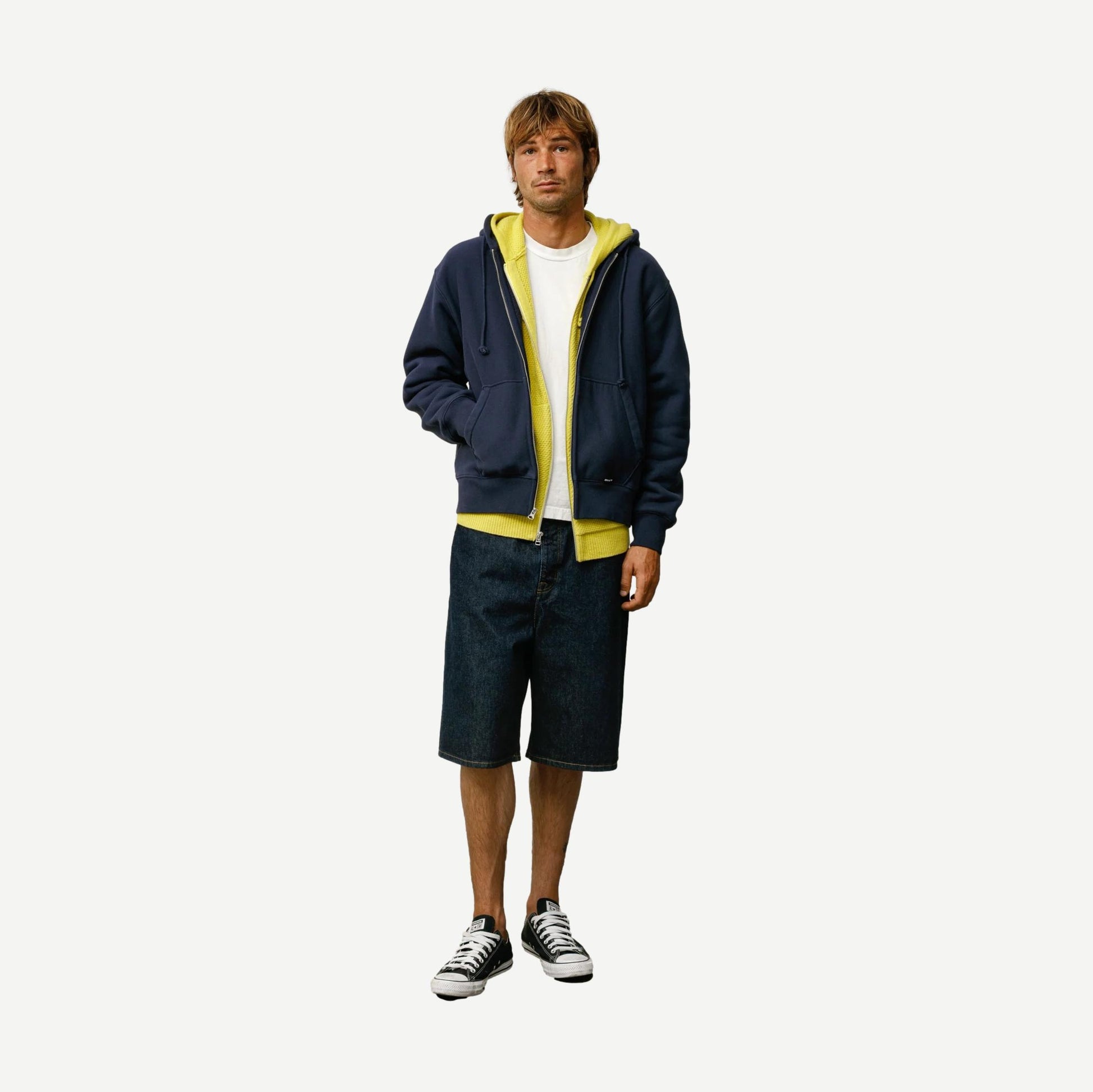 Stussy navy baggy beach shorts with relaxed fit, front pockets, and drawstring waistband, ideal for casual summer wear