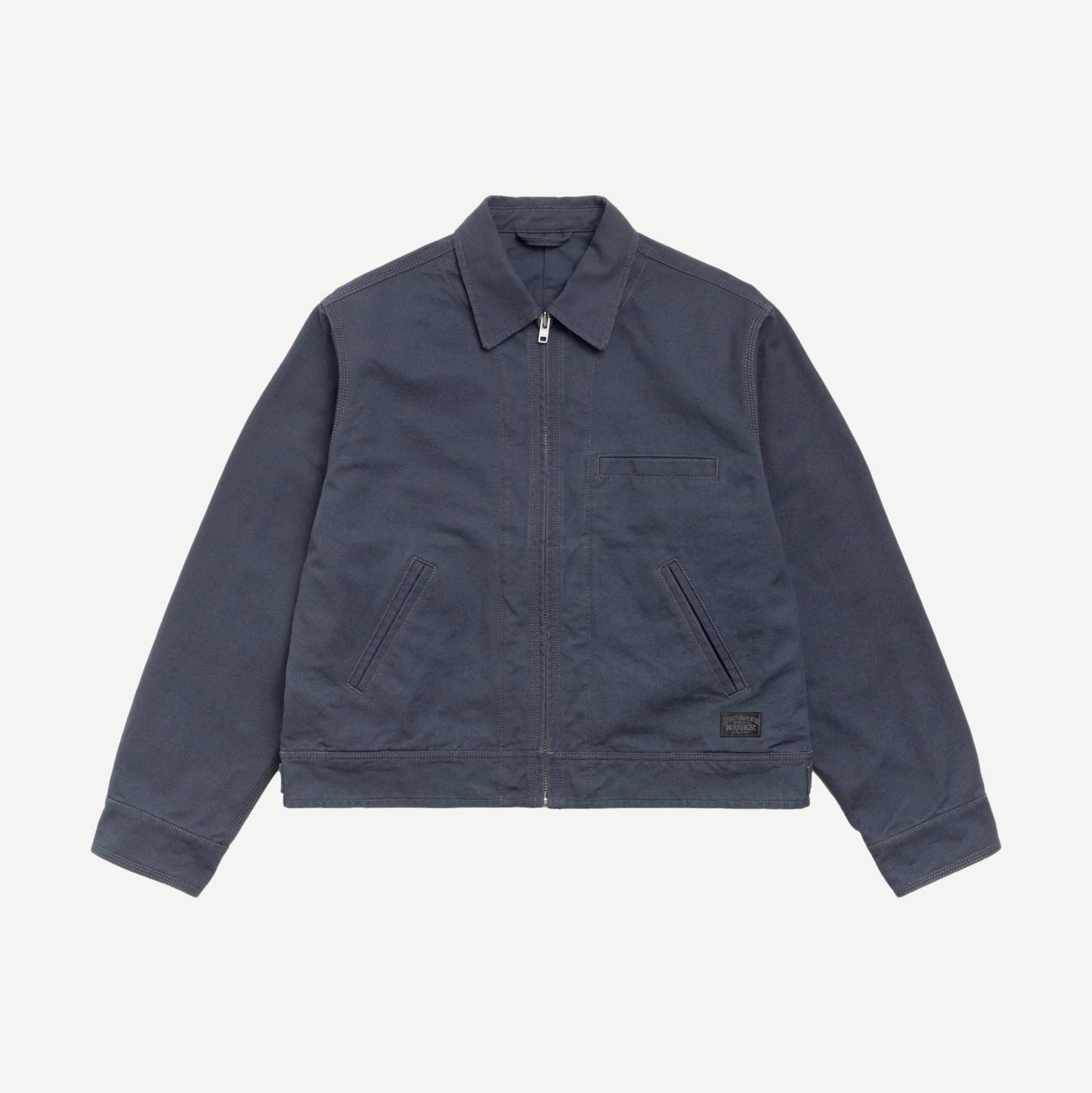 Blue Stussy work jacket with collar, featuring a casual design and button front, suitable for workwear and outdoor activities.