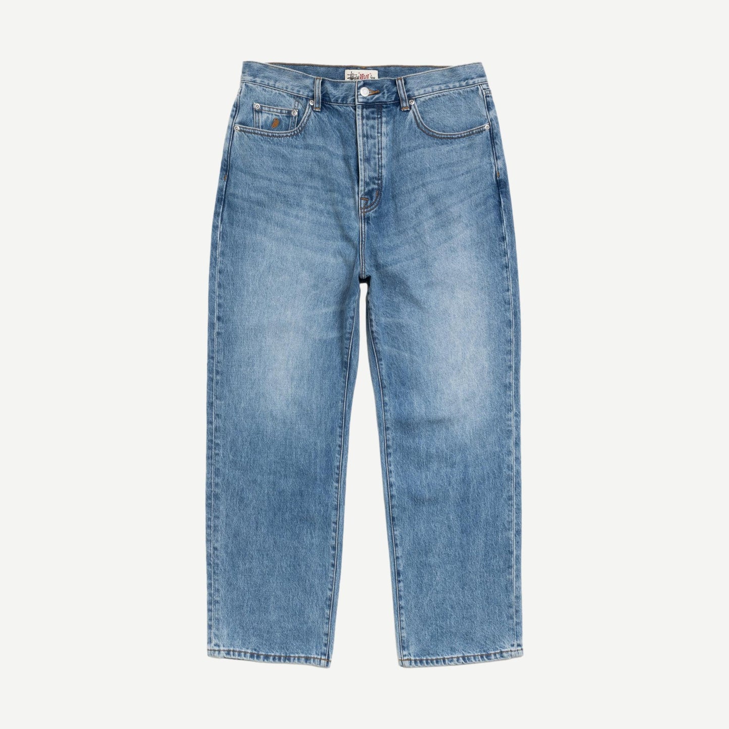 Stussy Big Ol Jean Denim in Indigo Stone Wash showing classic fit, distressed details, and stone-washed blue denim fabric.
