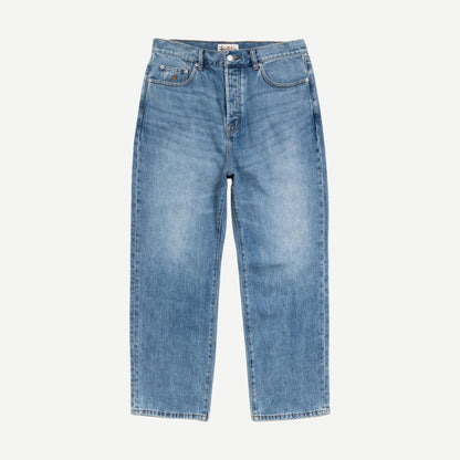 Stussy Big Ol Jean Denim in Indigo Stone Wash showing classic fit, distressed details, and stone-washed blue denim fabric.