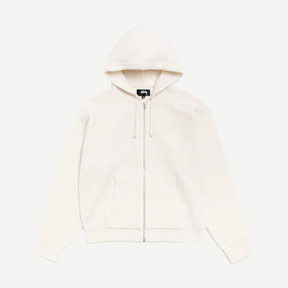 Stussy textured zip hooded sweater in bone color, featuring a hood, front zipper, and cozy fabric, casual streetwear style.
