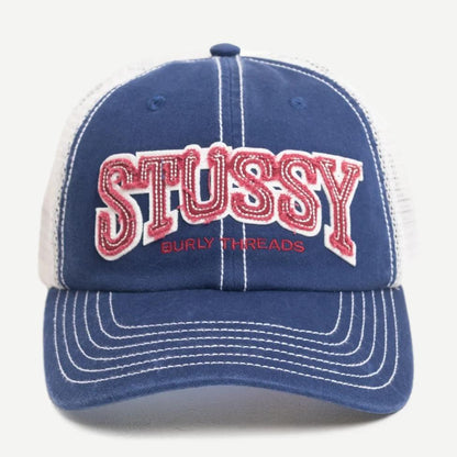 Stussy MD Burley Threads Navy trucker hat with mesh back and curved brim, casual headwear for outdoor wear.