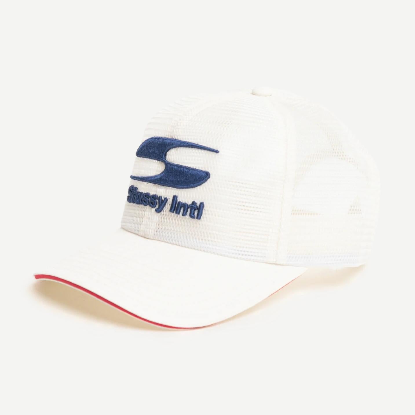 Stussy MD Moto S Trucker hat in bone color with adjustable strap and mesh back, casual streetwear accessory.