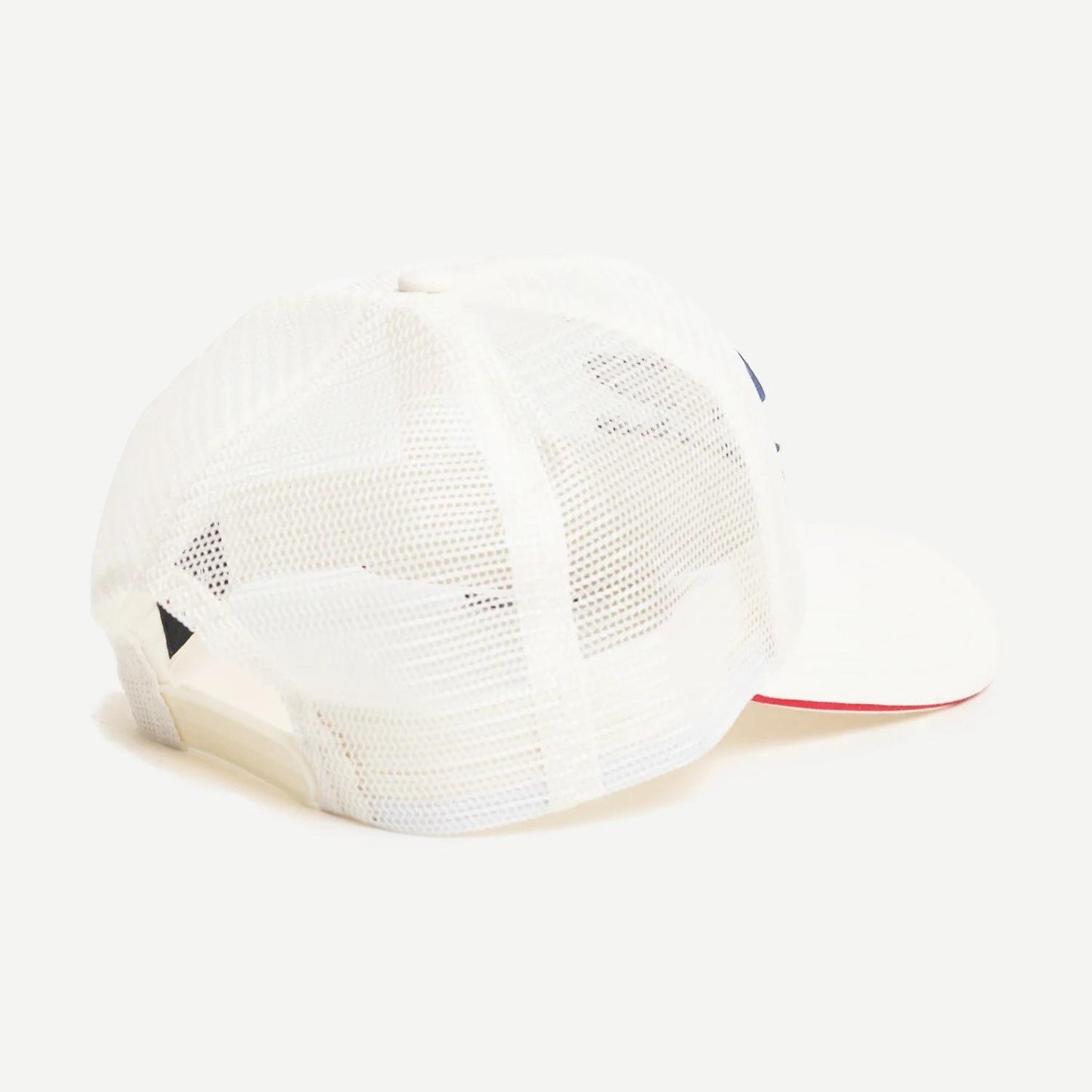 Stussy MD Moto S Trucker hat in bone color, featuring a mesh back and curved brim for casual streetwear style.