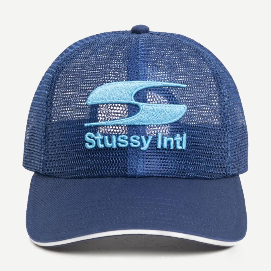 Stussy MD Moto S Trucker hat in navy with mesh back and curved brim, casual accessory for streetwear style.