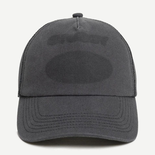 Stussy HP Ghost Logo Trucker Hat in black with adjustable snapback and embroidered ghost logo on front, casual streetwear style.