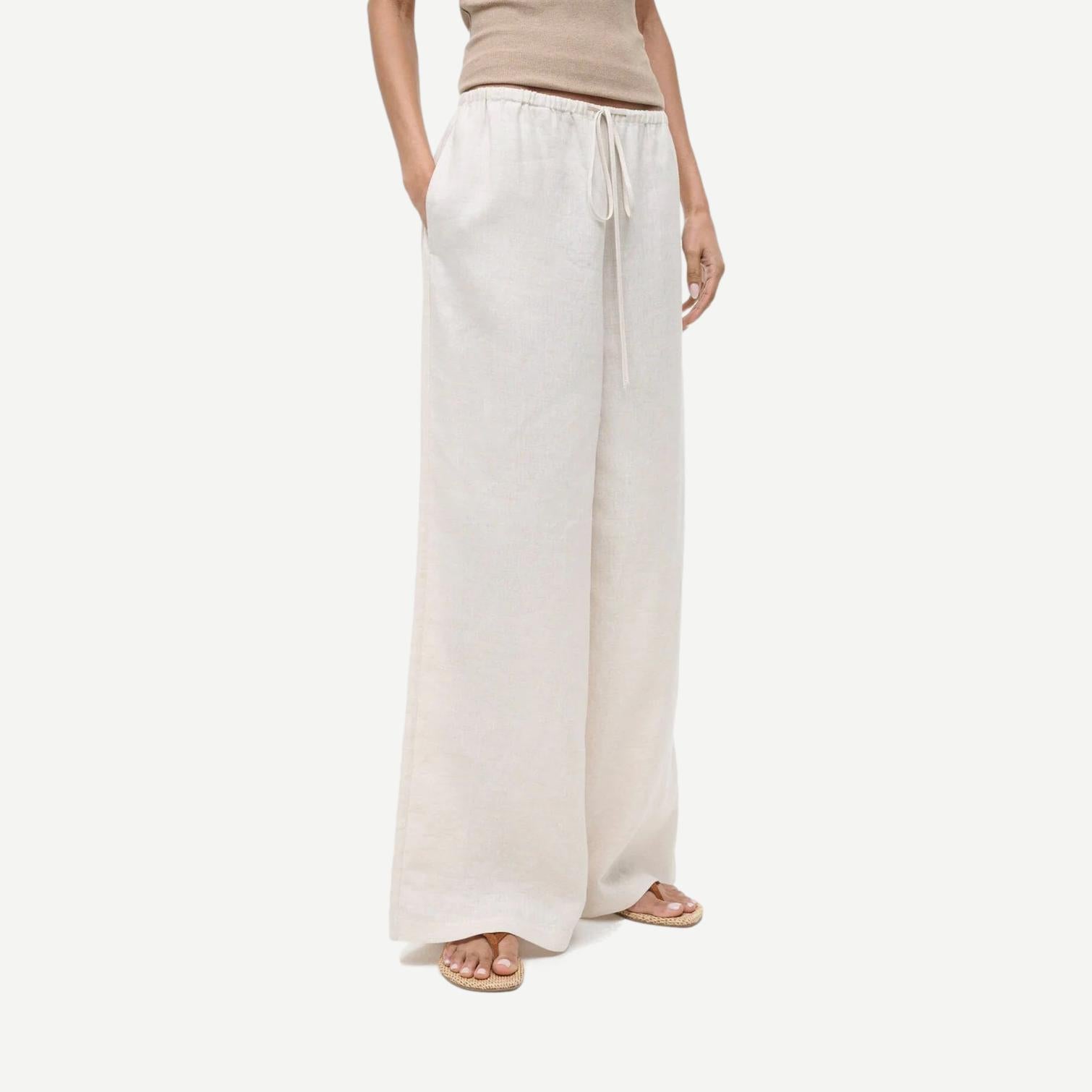 Staud Mateo Linen Pant in natural color, featuring a relaxed fit and visible linen fabric details.