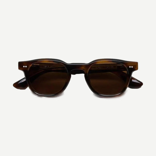 Chimi 01 eyewear featuring sleek, modern design with clear lenses and stylish black frames.