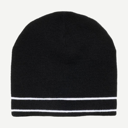 Black Stussy Clover Skullcap beanie shown on a model, featuring a snug fit and Stussy logo detail.