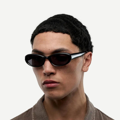 Chimi 09 black eyewear with sleek design, featuring tinted lenses and modern frame style for everyday wear.