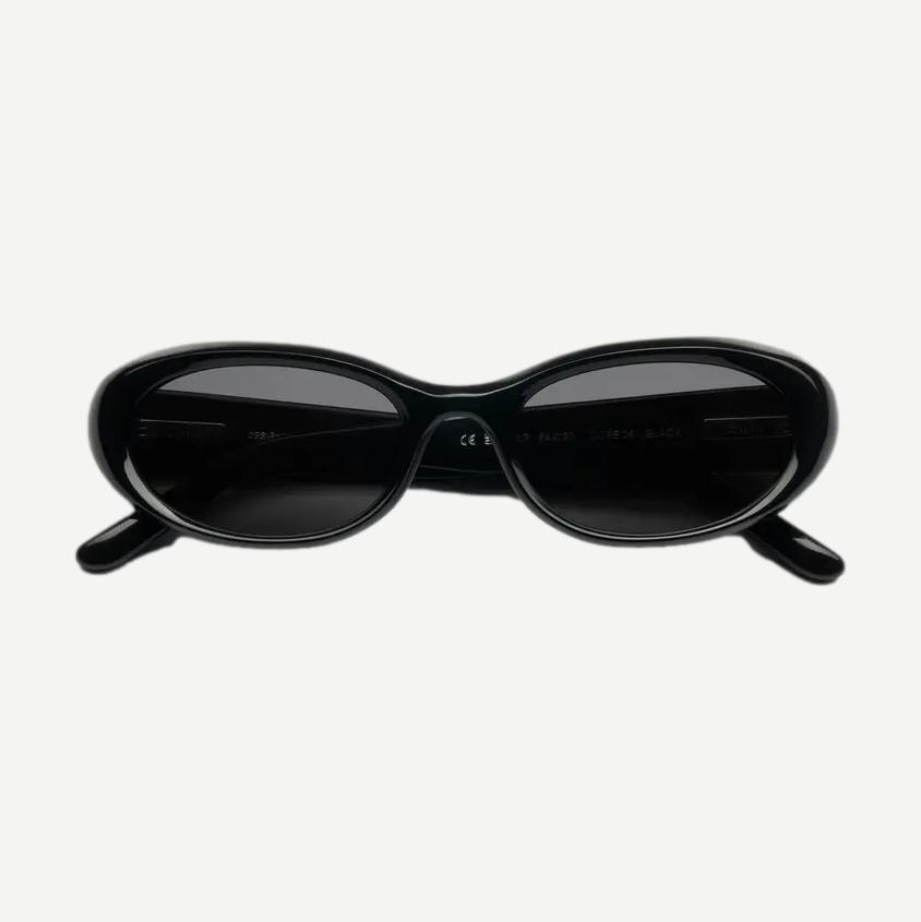 Chimi 09 black eyewear with sleek frame design, featuring tinted lenses and modern style, by Chimi.