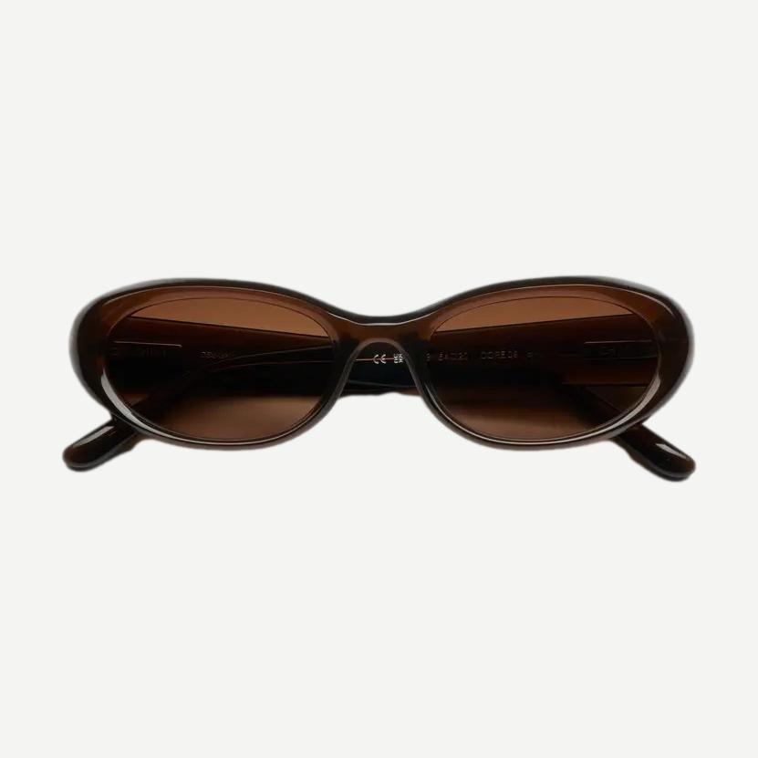 Chimi 09 brown eyewear with rounded frames, stylish and modern design, showcasing the Chimi brand's fashion-forward glasses.