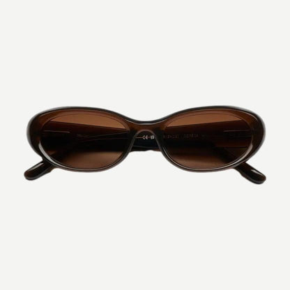 Chimi 09 brown eyewear with rounded frames, stylish and modern design, showcasing the Chimi brand's fashion-forward glasses.