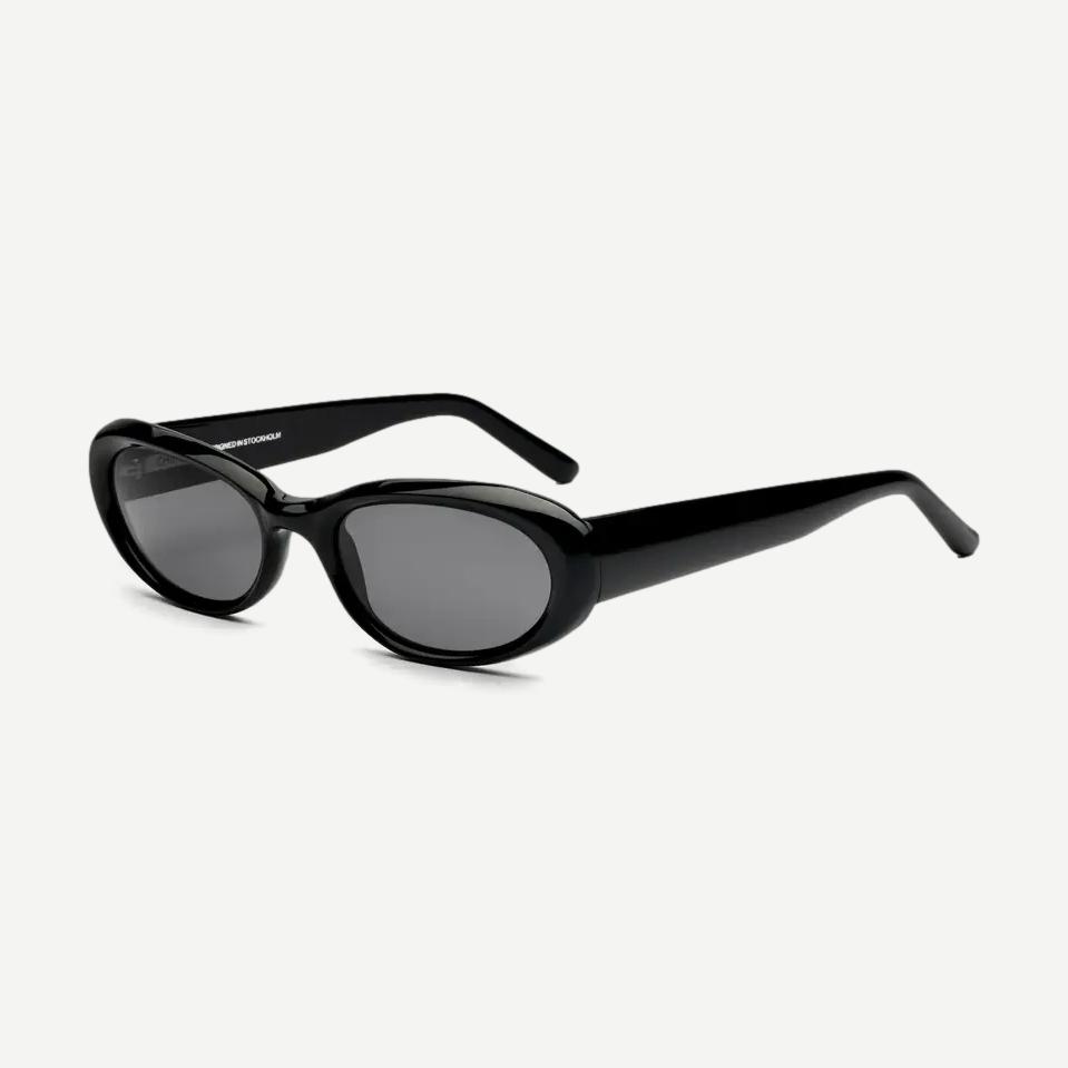 Chimi 09 black eyewear with bold frame and clear lenses, stylish accessory for everyday wear