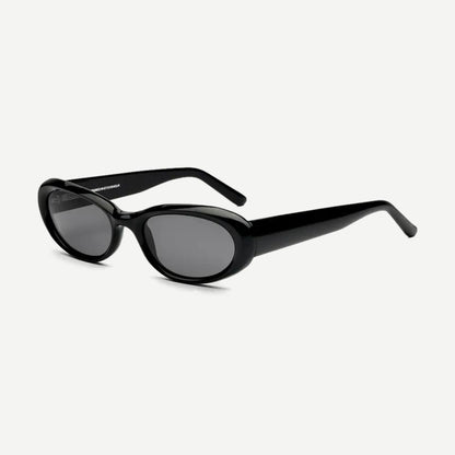 Chimi 09 black eyewear with bold frame and clear lenses, stylish accessory for everyday wear