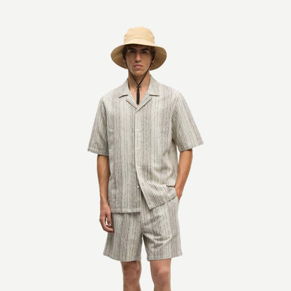 Brown Oscar AX shirt by Samsoe Samsoe with a classic collar and button front, displayed on a hanger.