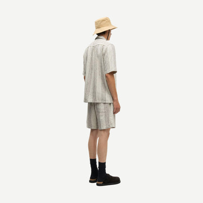 Samsoe Samsoe Oscar AX brown shirt, men's casual shirt with button-up front and collar, displayed on a hanger.