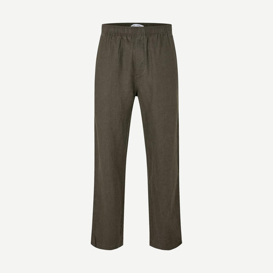 Black olive Sajabari x Trouser pants by Samsoe Samsoe, shown in a close-up image highlighting the fabric and fit.