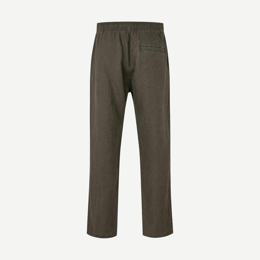 Samsoe Samsoe Sajabari x Trouser in black olive, stylish pants with a relaxed fit, shown on model with side view.