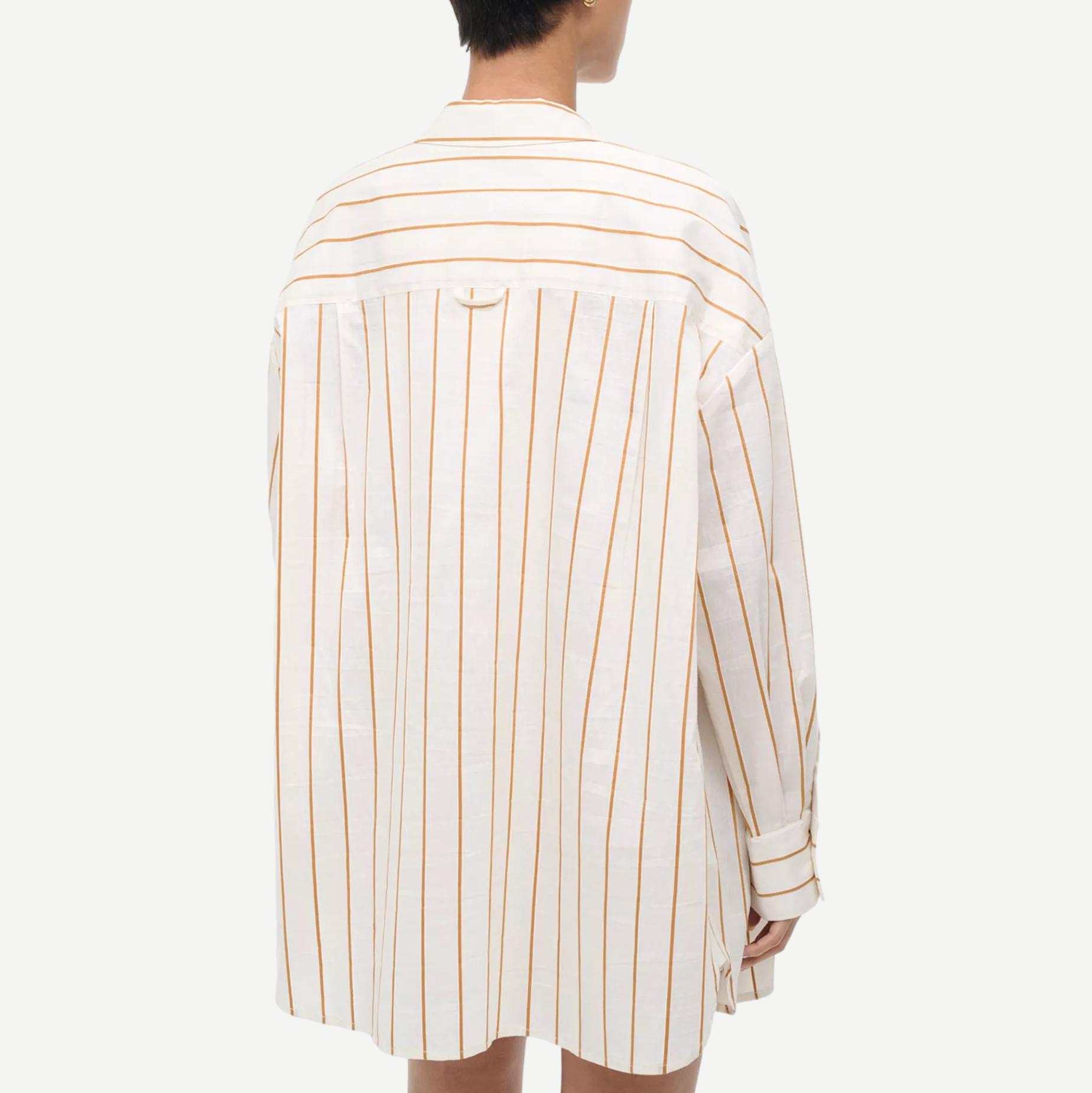 Staud Kendy Top in Solana Stripe, a stylish shirt with vibrant striped fabric and button-front design.