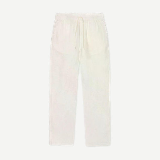 Les Deux Patrick linen pants in eggnog white, casual pants with a relaxed fit, shown on a model.