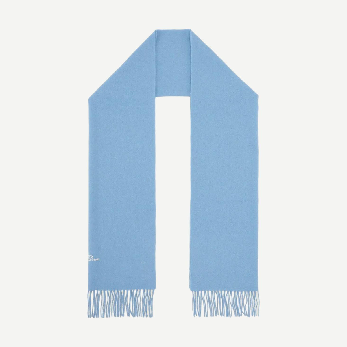 Les Deux Signature Solid Scarf in Allure blue, folded to show its soft fabric and clean design