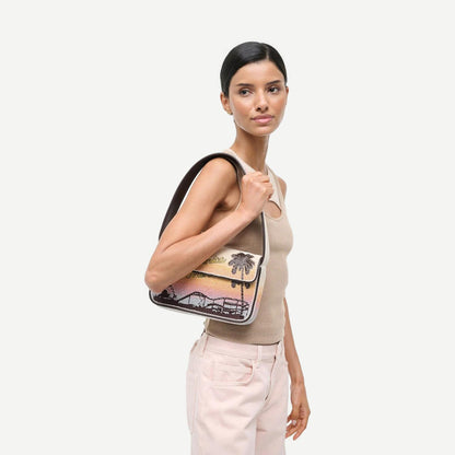 Staud Tommy beaded purse in Santa Monica Sunset with intricate beadwork and a compact design, perfect for stylish occasions.