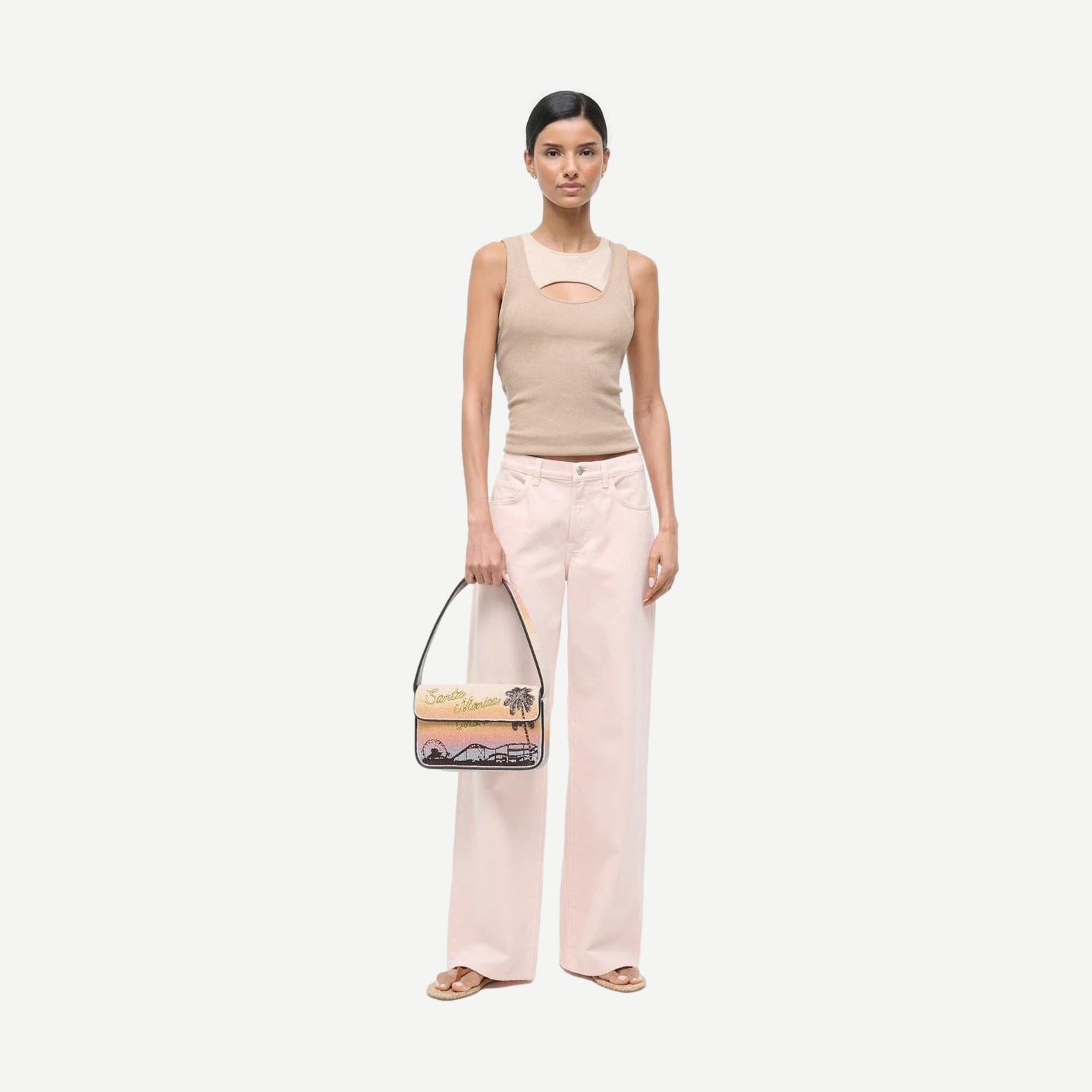 Staud Tommy beaded purse in Santa Monica Sunset design, featuring intricate beadwork and a compact shape.