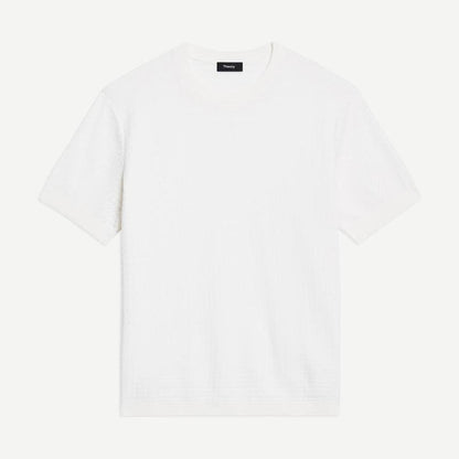 Theory Damian SS Top in winter ivory, lightweight T-shirt with short sleeves and soft fabric, showcasing a casual and stylish fit.