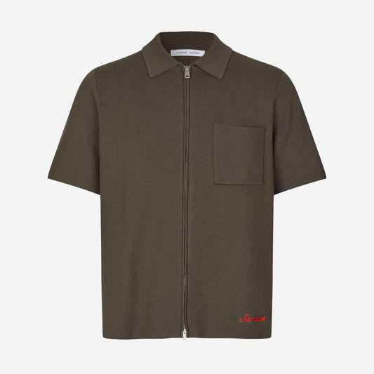 Samsoe Samsoe Sarico Zip Shirt in black olive, casual men's shirt with a front zipper and long sleeves, displayed on a hanger.