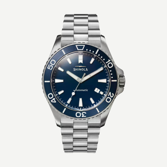 Shinola Monster Automatic Lake Michigan 39mm watch with blue dial, Mother of Pearl accents, and silver case in gift set.