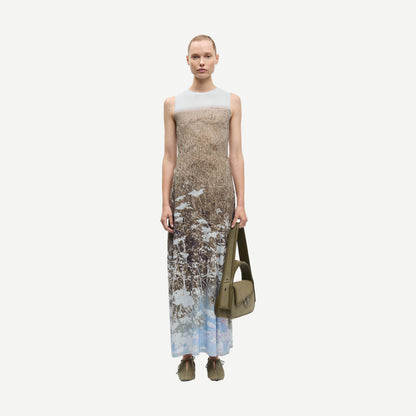 Samsoe Samsoe Saangel Dress in Hazy Fields with flowing fabric and floral print, shown on a model.