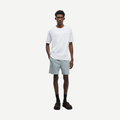 Light denim Sajabari Shorts by Samsoe Samsoe with a relaxed fit and classic five-pocket design, displayed on a plain background.