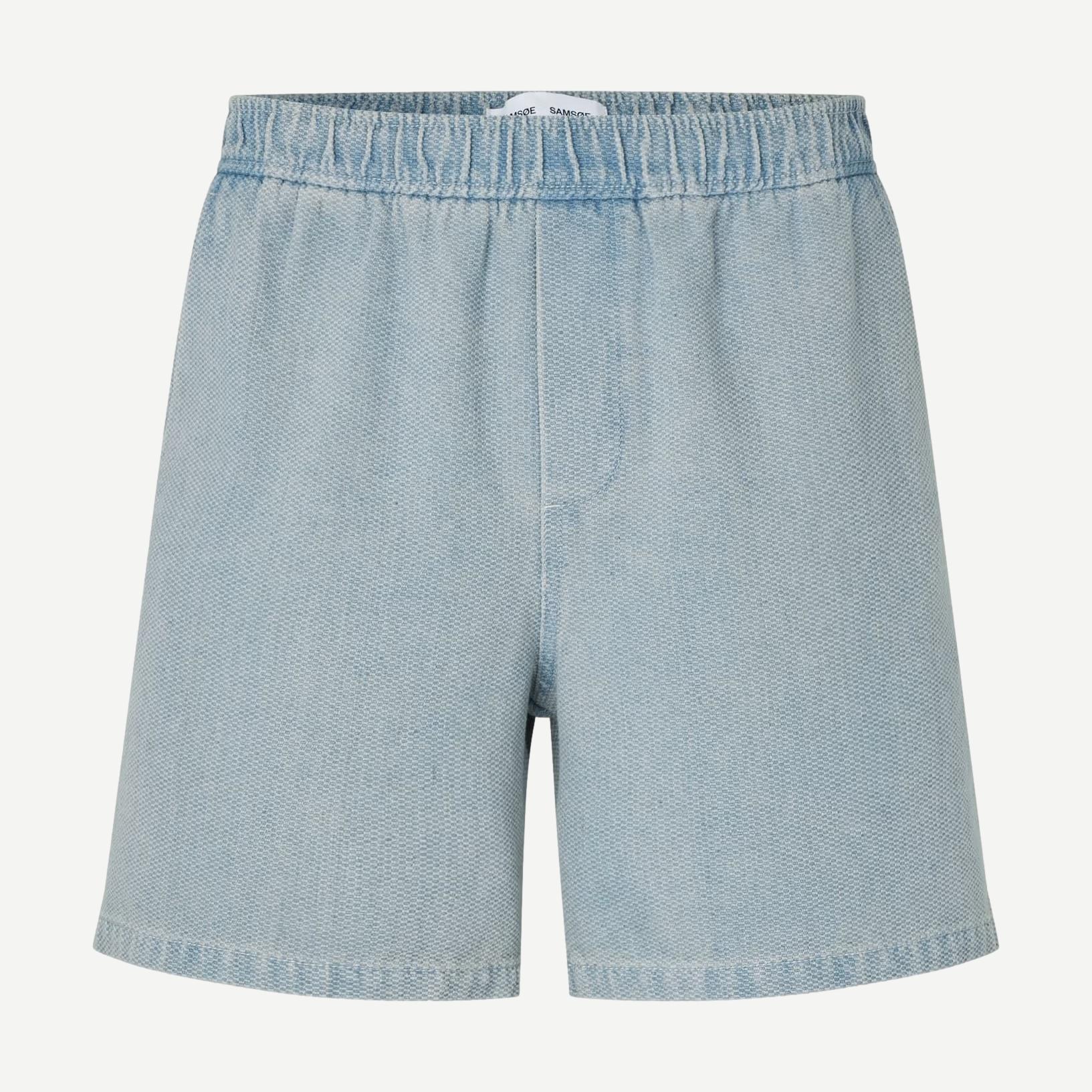 Light denim Sajabari Shorts by Samsoe Samsoe, featuring a casual fit and classic denim texture, shown on a model.