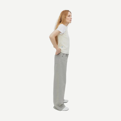 Still Here Cool Jean in Dust, stylish denim pants with a relaxed fit, shown on a hanger against a neutral background.