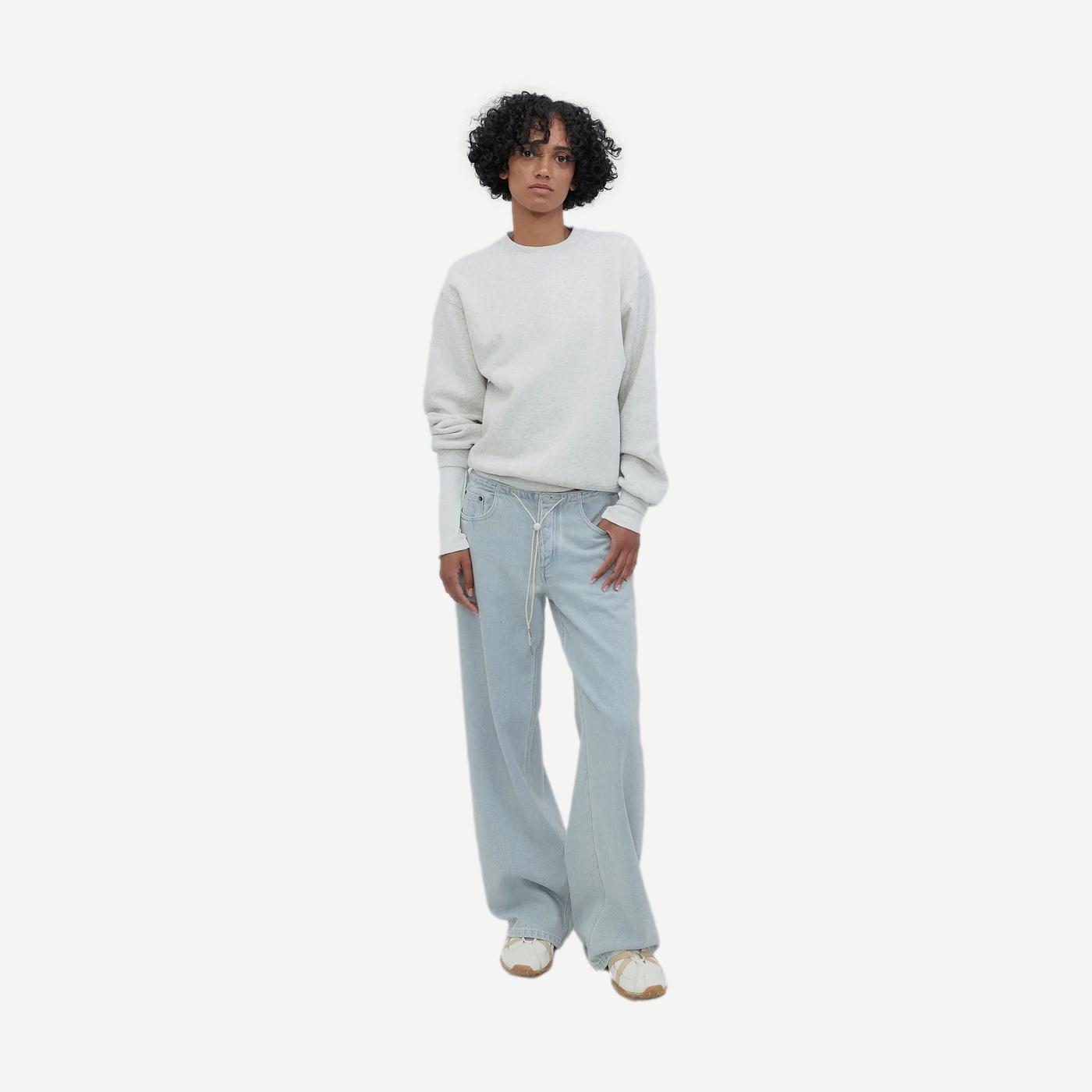 Still Here Cool Jean in Cloud Vintage Blue denim, showing the classic fit and distressed details of this stylish denim product.