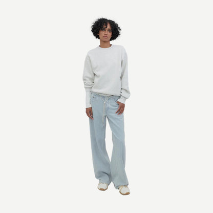 Still Here Cool Jean in Cloud Vintage Blue denim, showing the classic fit and distressed details of this stylish denim product.